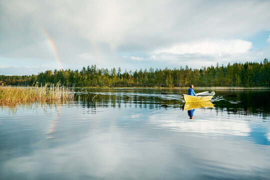 Finnland, 10 Tage leben im Mökki, auf einer Insel die nur mit dem Ruderboot zu erreichen ist. Der nächste Ort Juvola ist 1 km entfernt. Region Linnansaari Nationalpark, Ein Regenbogen am Horizont