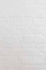 white painted brick wall in white paint
