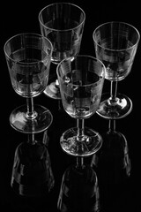 Transparent glasses on black backdrop