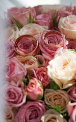 Rings on a wedding bouquet.
