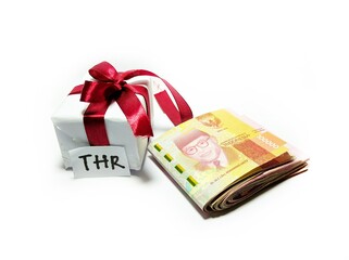 Religious Holiday Allowance (THR) with gift box and Indonesian currency