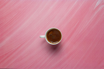 turkish coffee and mug on pink backdrop
