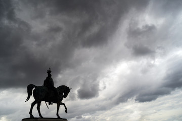 Italy, Rome: The equestrian statue of Victor Emmanuel on the Altar of the Fatherland before a storm