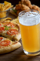 glass of beer with pizza Margarita