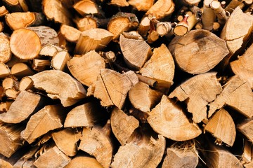 Closeup of chopped firewood in a stack ready for burning.