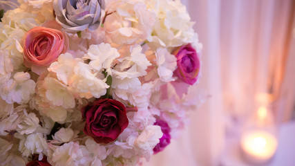 On the wedding table flowers with food.