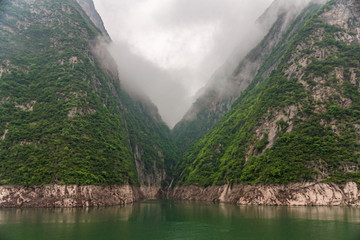 Guandukou, Hubei, China - May 7, 2010: Wu Gorge on Yangtze River. Landscape: White mist descends...