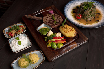 vegetables alongside grilled meat
