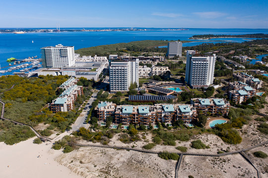 Troia Peninsula, Setubal, Portugal - May 7, 2020 - Aerial Bird's eye view of Troia Peninsula on a sunny day, near Lisbon. Sado river in the background