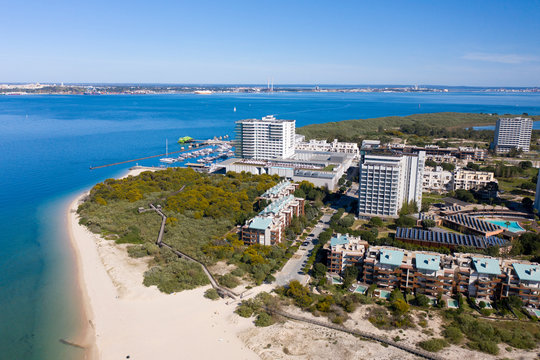 Troia Peninsula, Setubal, Portugal - May 7, 2020 - Aerial Bird's eye view of Troia Peninsula on a sunny day, near Lisbon. Sado river in the background