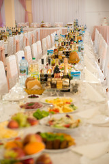 Wedding room with decor and cake.