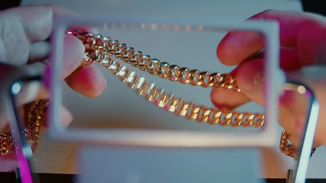 gold chain under magnification
