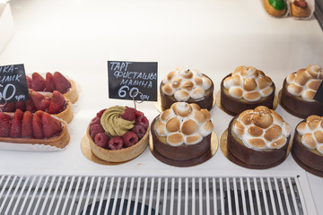 Showcase confectionery. Various delicious sweet desserts
