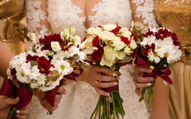 A few girls with a bride and bouquets
