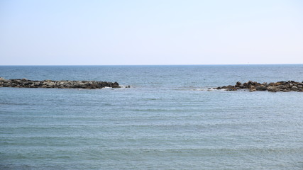 Beautiful sea with stones in Italy.