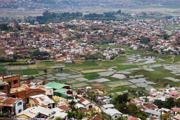 An aerial view shows the flooded rice paddies of Antananarivo, Madagascar sandwiched between...