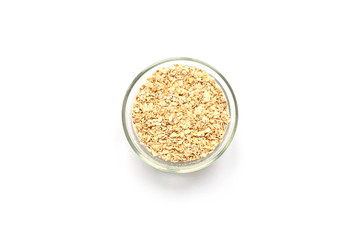 Oatmeal in glass bowl isolated on white background, top view
