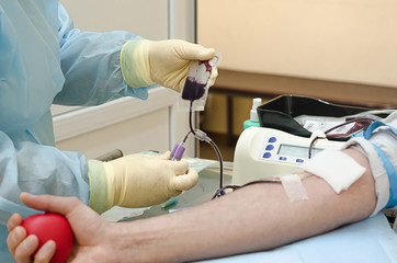 healthcare and charity. World Blood Donor Day - June 14th. transfusion of plasma and blood in the...