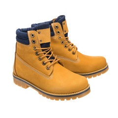 high hiking boots made of nubuck, object isolated on white background, clothing accessory