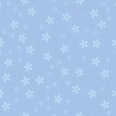 Daisies on a blue background. Seamless pattern.