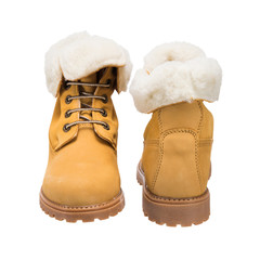 light brown winter boots with fur in everyday wear in cold weather, isolated clothing accessories on a white background