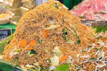 Fried instant noodles. Street food in Thailand