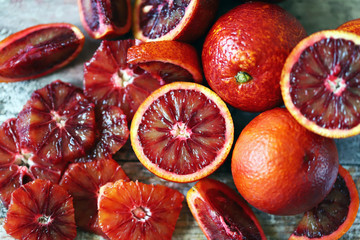 Selective focus. Fresh juicy red oranges. Bloody oranges slices.
