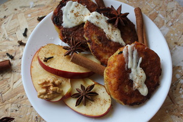 Cottage cheese pancakes cottage cheese with apple, nuts, and cinnamon. Ukrainian traditional food. Ukrainian national kitchen. 