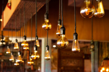 hanging vintage light bulb. cafe interior decoration