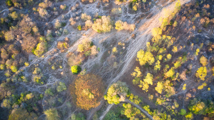 This unique photo shows the landscape of Thailand from above with trees and dirt roads! the picture was taken in Hua Hin with a drone in the evening sun