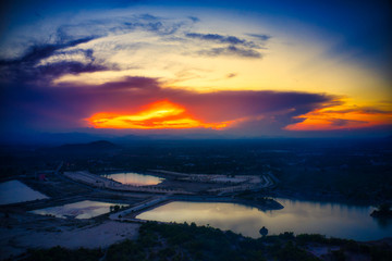 This unique photo shows the hilly landscape with lakes, from hua to thailand, taken with a drone during a fantastic sunset!