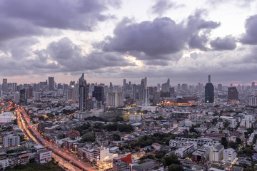 Sky view of Bangkok with skyscrapers in the business district in Bangkok in the evening beautiful twilight give the city a modern style.