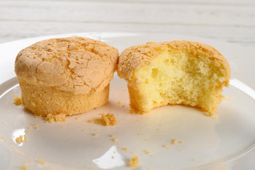 homemade small cup cakes one with a bite