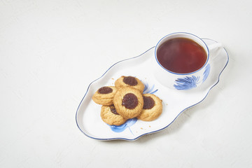 delicious tea and biscuits with quince jam