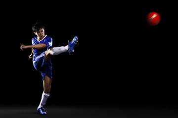 Man kicking ball © ImageHit