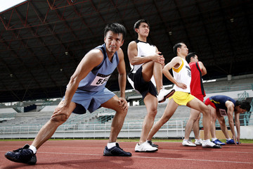 Fototapeta na wymiar Men stretching before a race