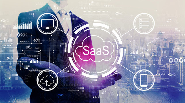 SaaS - software as a service concept with businessman on a city background