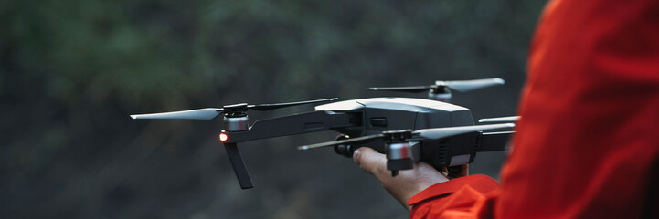 Drone ready to fly off a hand