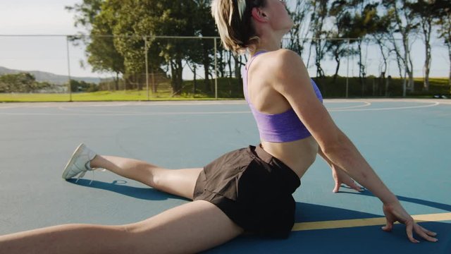 Young Woman Does Cobra Pose Abs Stretch on Sunny Morning. Medium Shot