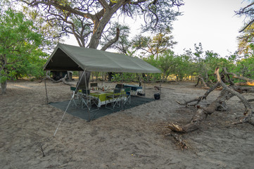 Safari camp at sunrise in the Botswana wilderness