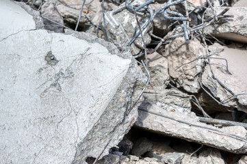 Destroyed concrete slab with many cracks.