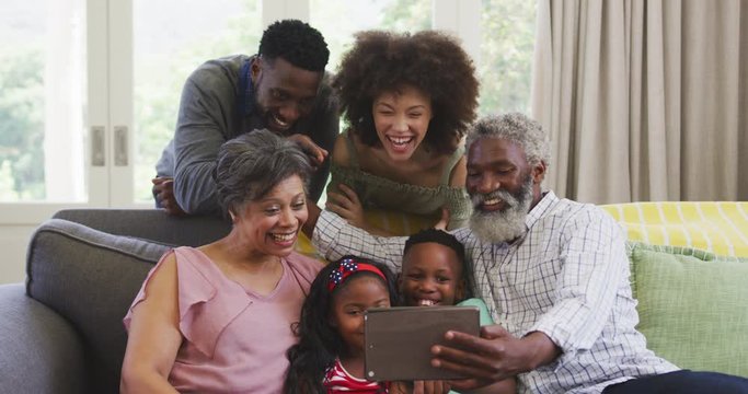 Happy African American family spending time together at home