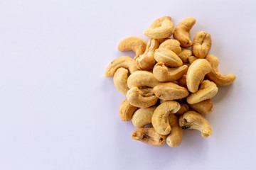 Many Roasted salted cashew nuts  isolated on a white background