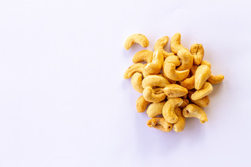Many Roasted salted cashew nuts  isolated on a white background