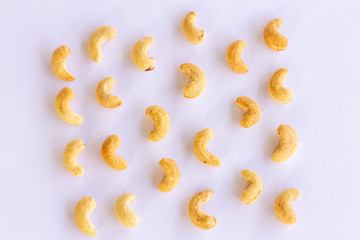 Roasted Cashew nuts isolated on white background with clipping path and full depth of field. Set or collection.