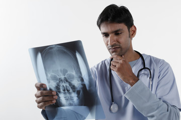 Doctor examining x-ray