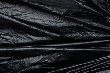Disposable black garbage bag texture