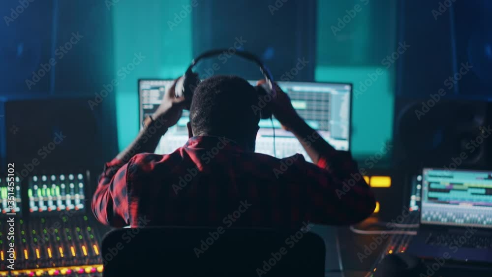 Aufkleber stylish artist, musician, audio engineer, producer takes place at his control desk in music record s