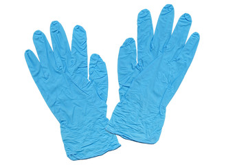 A pair of thin rubber medical gloves are isolated against a white background. Medical equipment close-up.