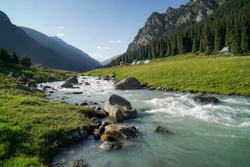 Fototapeta na wymiar Altyn Arashan, Kyrgyzstan: Beautiful alpine meadows and tourist destination